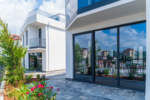 Загородный дом в городской инфраструктуре.