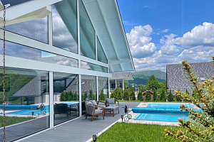 Дом в стиле Шале с новым дизайнерским ремонто...