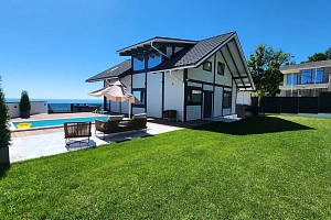 Дом с бассейном и видом на море в элитном рай...