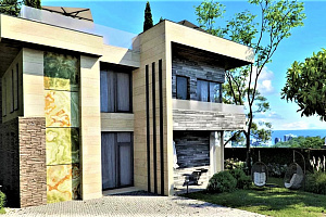 Дом в стиле хай-тек в  элитном коттеджном пос...